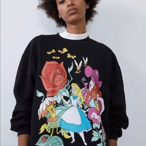 Alice in Wonderland Zara’s sweater.